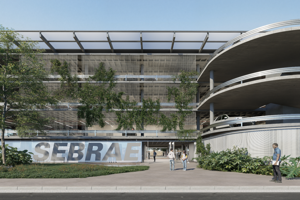 Entrada da Nova Sede SEBRAE/RO, com pele de tijolo vazado, rampa de acesso e letreiro SEBRAE